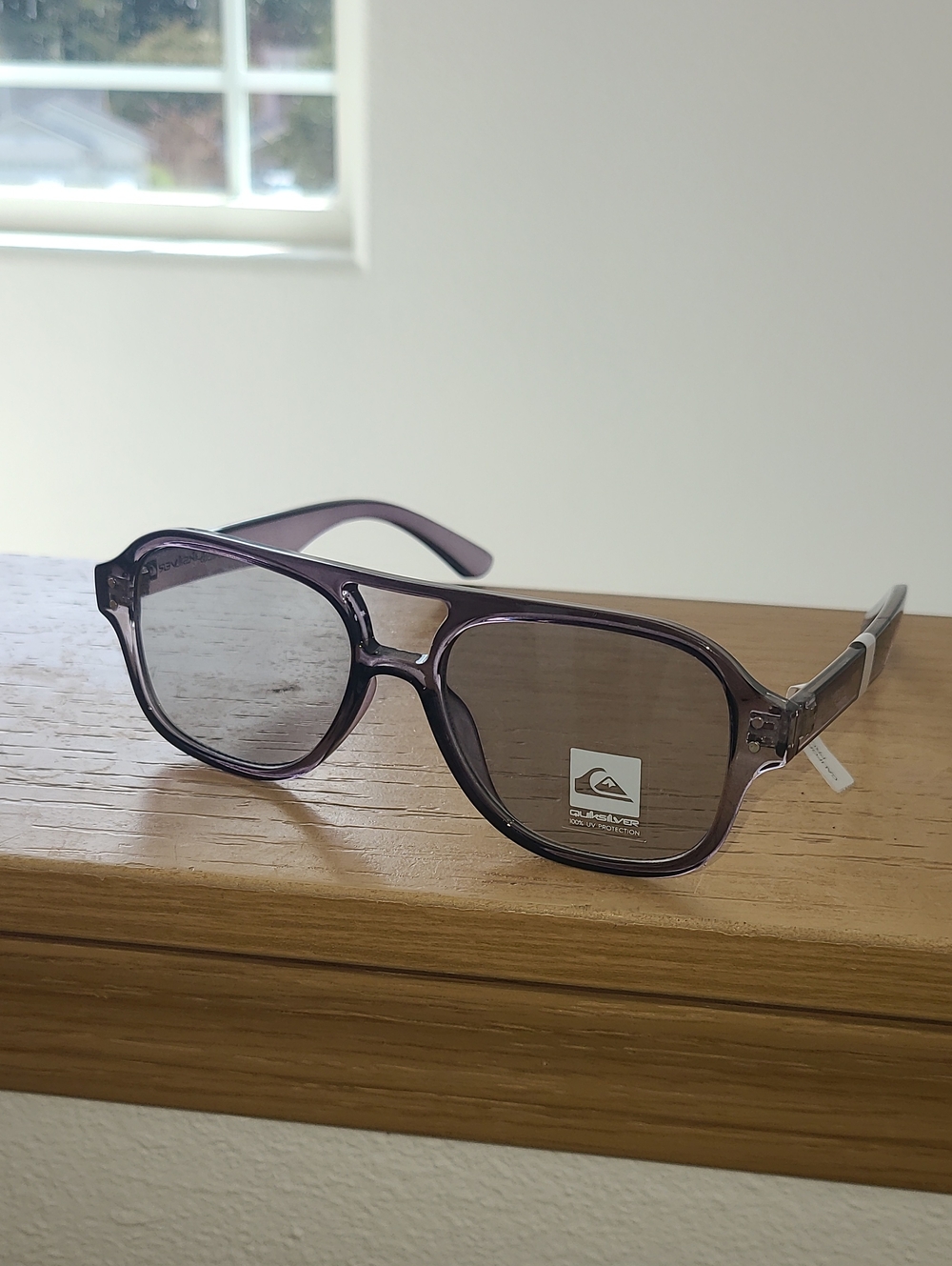Quiksilver Translucent Grey Frame Sunglasses with Gray Lenses